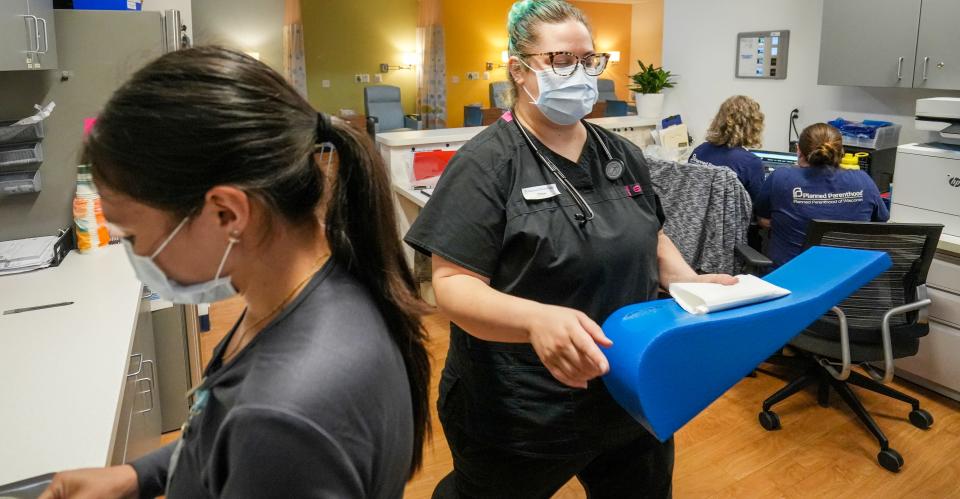 The Planned Parenthood South Water Street Health Care Center in Milwaukee bustles with activity prior to the U.S. Supreme Court decision that overturned Roe v. Wade. The clinic resumed offering abortion services on Monday.