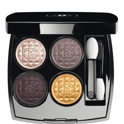 <p>You may not be able to afford one of the brand’s iconic tweed jackets, but the next best thing is this adorable eyeshadow quad in the shape of buttons. The shades are incredibly flattering, from shimmery gold and purples to a red-black shade inspired by Chanel’s famous Vamp nail polish. <a href="http://www.chanel.com/en_US/fragrance-beauty/makeup-eyeshadow-les-4-ombres-139882/sku/139883" rel="nofollow noopener" target="_blank" data-ylk="slk:Chanel Les 4 Ombres Eyeshadow Palette in Signe Particulier;elm:context_link;itc:0;sec:content-canvas" class="link ">Chanel Les 4 Ombres Eyeshadow Palette in Signe Particulier</a> ($65)</p>