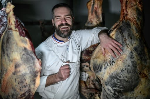 Romain Leboeuf at his butcher shop in Paris. He buys entire cows from the son of the same man who supplied his own father, also a butcher