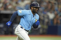 Tampa Bay Rays' Yandy Diaz runs to second base after hitting a double off Chicago White Sox starting pitcher Lucas Giolito during the fifth inning of a baseball game Sunday, April 23, 2023, in St. Petersburg, Fla. (AP Photo/Chris O'Meara)