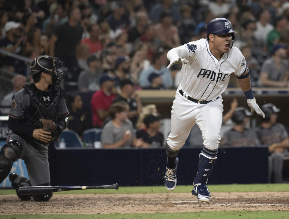 San Diego Padres' Christian Villanueva heads to first with a walk-off single against the Arizona Diamondbacks during a baseball game in San Diego, Saturday, Aug. 18, 2018. The Padres won 7-6. (AP Photo/Kyusung Gong)