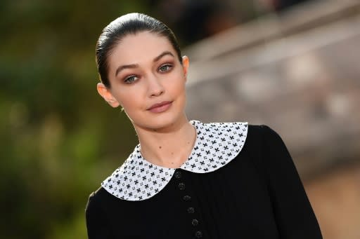 Mother superior: American model Gigi Hadid wears a nun's habit dress with a claudine collar at the Chanel haute couture show in Paris