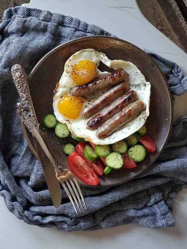 <p>Ally's Kitchen</p><p>Nothing beats a classic breakfast.</p><p><strong>Get the recipe: </strong><a href="https://allyskitchen.com/sausage-links-and-eggs/?fbclid=IwAR3isqAl2MaCNrqtLy9XwUuUxP-oT2j81R6_qJnlI7mvqQKv0O1XTNcjR8k" rel="nofollow noopener" target="_blank" data-ylk="slk:Sausage Links and Eggs;elm:context_link;itc:0;sec:content-canvas" class="link "><strong>Sausage Links and Eggs</strong></a></p>