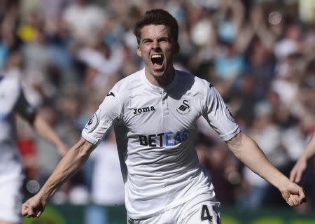 Britain Soccer Football - Swansea City v Stoke City - Premier League - Liberty Stadium - 22/4/17 Swansea City's Tom Carroll celebrates scoring their second goal Reuters / Rebecca Naden Livepic