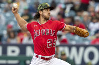 Los Angeles Angels starting pitcher Michael Lorenzen throws to an Oakland Athletics batter during the first inning of a baseball game in Anaheim, Calif., Saturday, May 21, 2022. (AP Photo/Alex Gallardo)