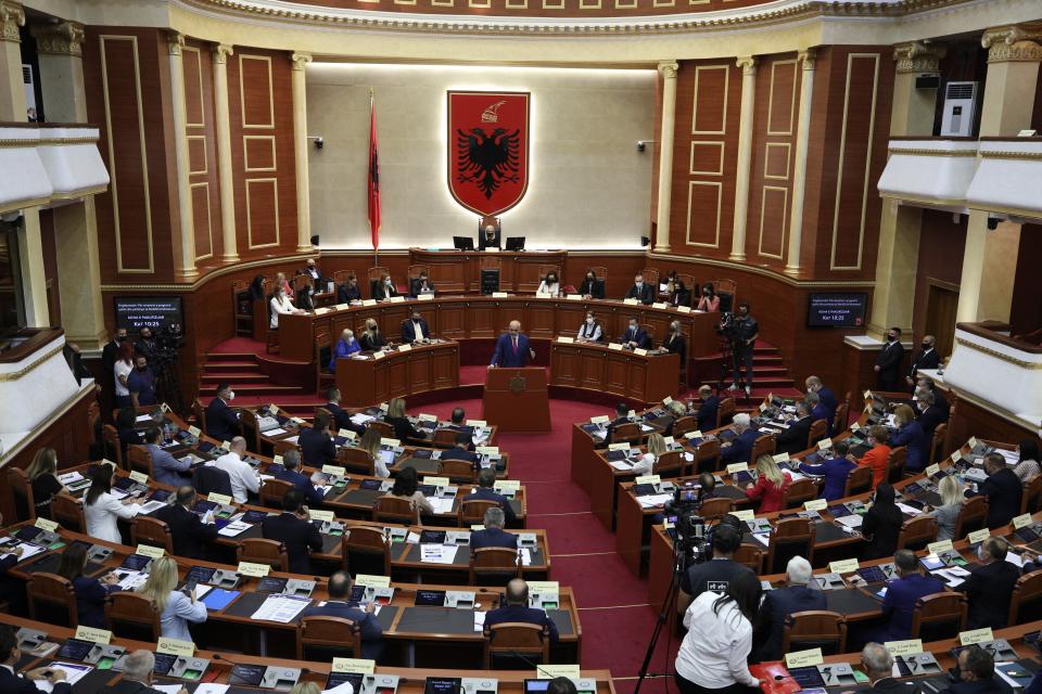 Albanian Prime Minister Edi Rama speaks during a debate at the parliament in Tirana, Albania, Thursday, Sept. 16, 2021. Albania's parliament was to vote late Thursday to approve the new, female-dominated Cabinet of Prime Minister Edi Rama, with 12 of the 17 jobs going to women, propelling Albania to the top of global rankings in terms of the percentage of women holding Cabinet positions. (AP Photo/Franc Zhurda)