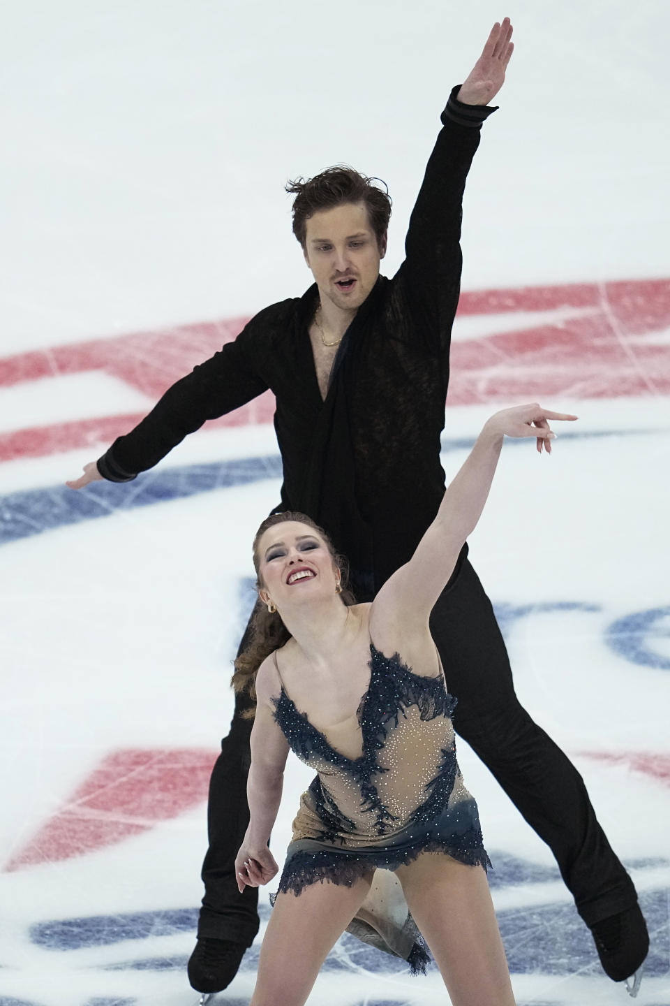 Christina Carreira and Anthony Ponomarenko complete during the championship rhythm dance program at the U.S. figure skating championships Thursday, Jan. 25, 2024, in Columbus, Ohio. (AP Photo/Sue Ogrocki)