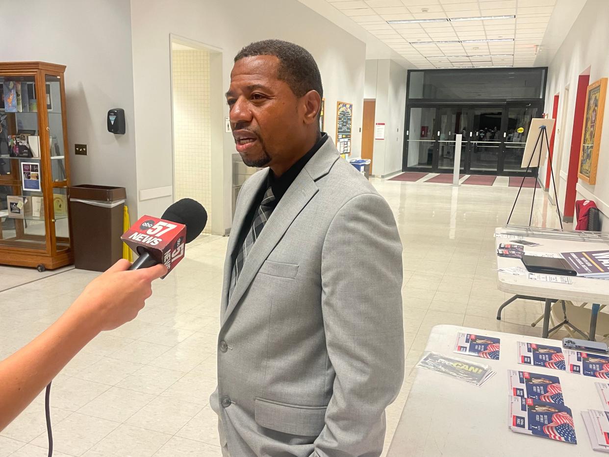 Roosevelt Stewart, the Republican candidate for the 2nd District seat on the South Bend Common Council, is interviewed by a reporter on Oct. 5 at Indiana University South Bend. Stewart is charged with a felony and a misdemeanor for allegedly punching and choking his 15-year-old daughter. He says his daughter fabricated the story to pull him out of the race.