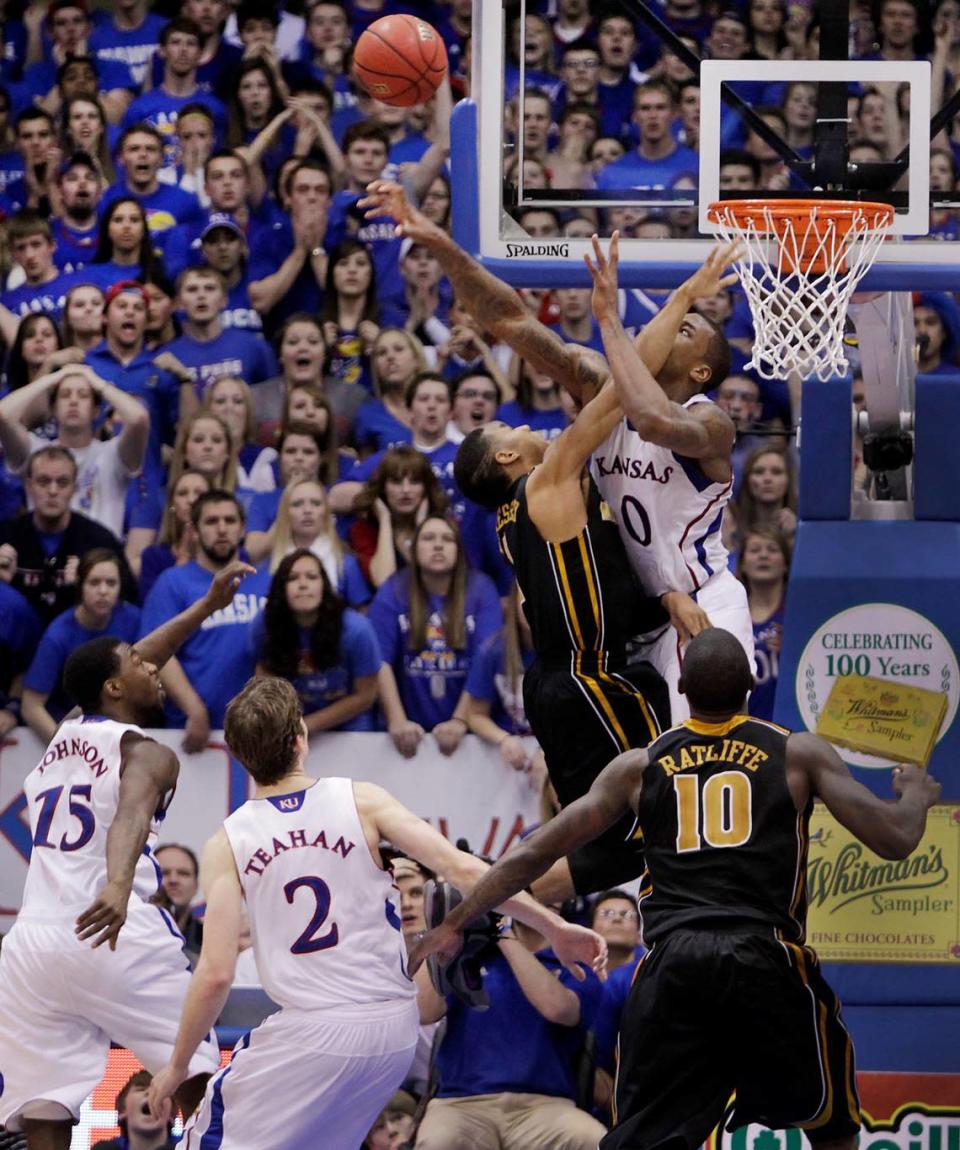 KU&#x002019;s Thomas Robinson helped send the game into overtime when he elevated above MU&#x002019;s Phil Pressey and blocked his shot. KU won 87-86 in overtime on Feb. 25, 2012 at Allen Fieldhouse in Lawrence.