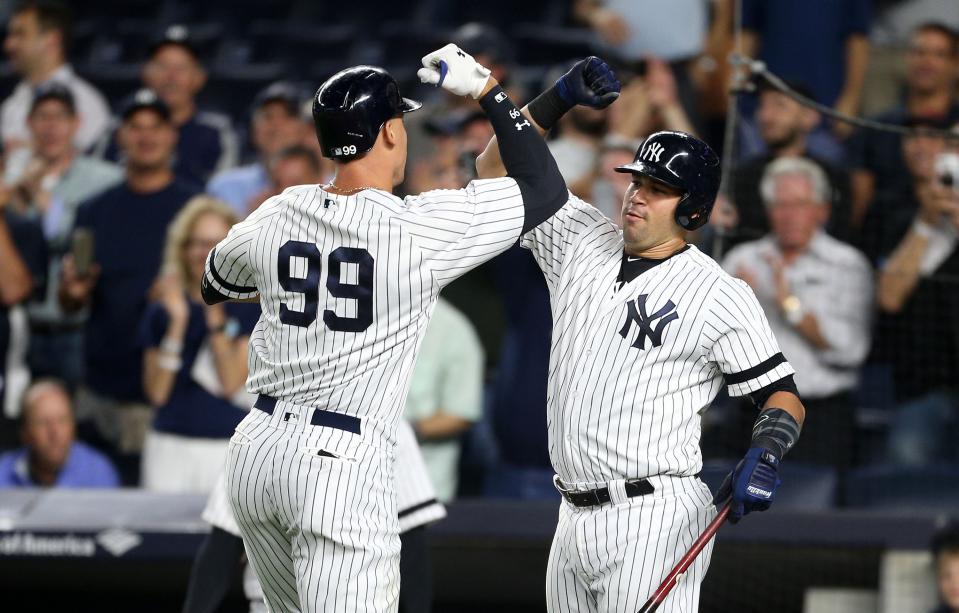 Aaron Judge (left) and Gary Sanchez celebrate Judge's homer Monday night. (Getty Images)