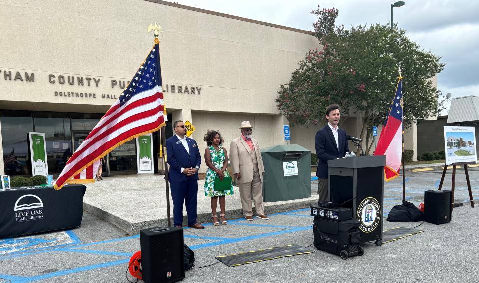 U.S. Senator Jon Ossoff (Democrat - Georgia) speaks at Live Oak Public Libraries (LOPL) Oglethorpe Mall Branch on June 21, 2024. Chatham County Board of Commissioners Chairman Chester Ellis (back right), LOPL Executive Director Lola Shelton-Council and Georgia State Senator Derek Mallow look on.