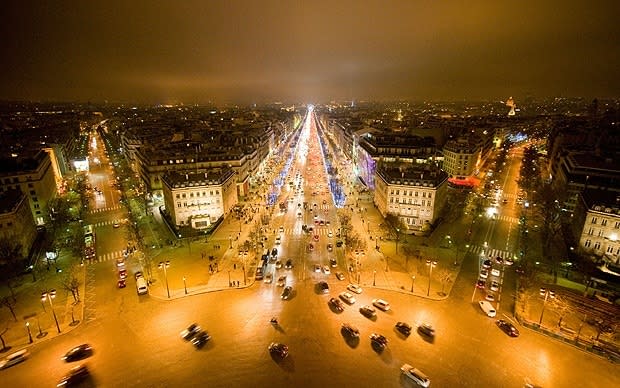 The Champs Elysees in Paris is one of the most famous streets in the world and is two kilometers long - Credit: Alamy