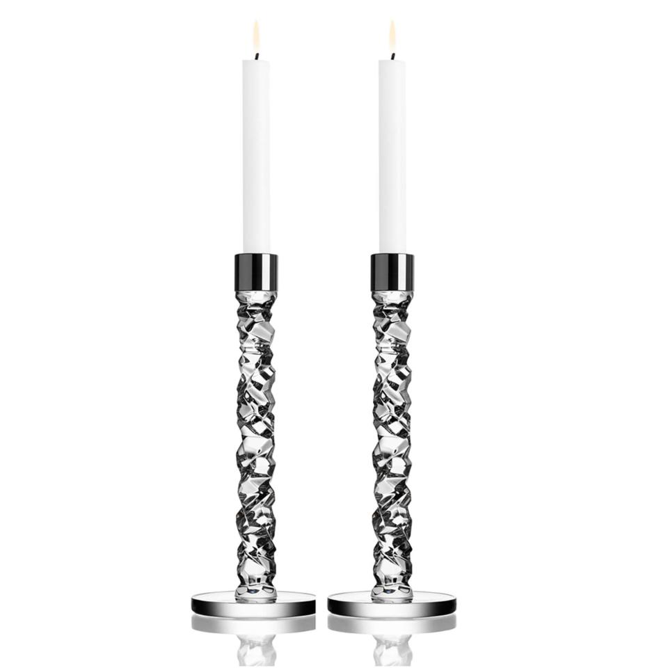 <p><a href="https://go.redirectingat.com?id=74968X1596630&url=https%3A%2F%2Fwww.neimanmarcus.com%2Fp%2Forrefors-carat-large-candlesticks-set-of-2-prod196440478&sref=https%3A%2F%2Fwww.townandcountrymag.com%2Fstyle%2Fhome-decor%2Fg37599279%2Fbest-wedding-gifts%2F" rel="nofollow noopener" target="_blank" data-ylk="slk:Shop Now;elm:context_link;itc:0;sec:content-canvas" class="link ">Shop Now</a></p><p>Carat Large Candlesticks, Set of 2</p><p>neimanmarcus.com</p><p>$400.00</p>