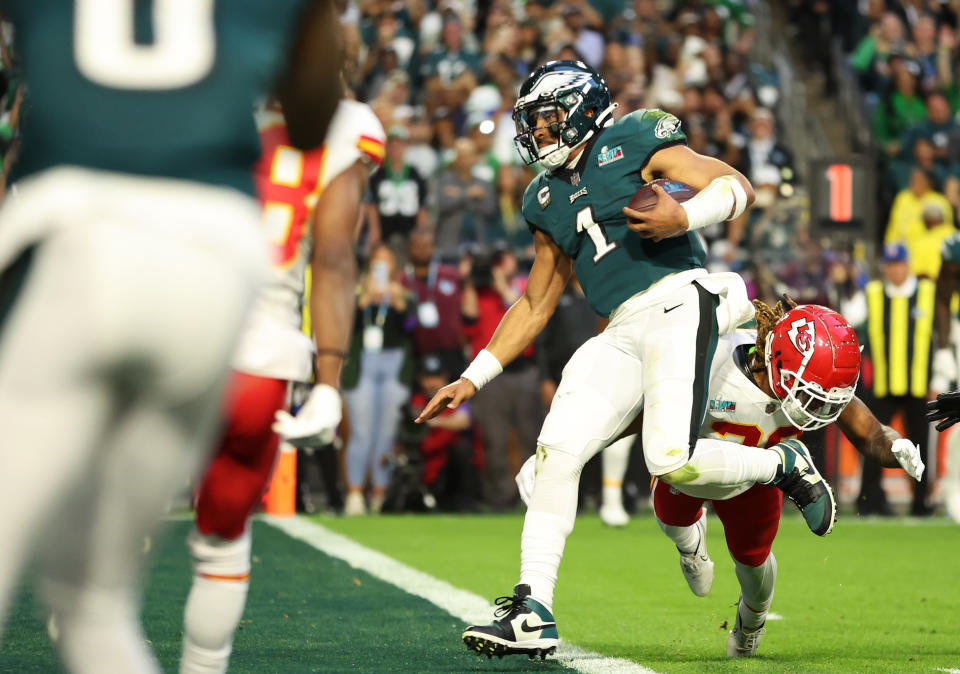 Jalen Hurts of the Philadelphia Eagles runs for his second touchdown in the first half of Super Bowl LVII. (Photo by Christian Petersen/Getty Images)