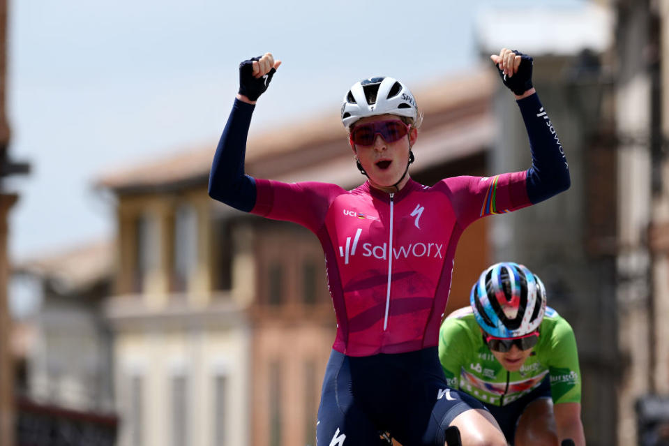 LERMA SPAIN  MAY 19 Demi Vollering of The Netherlands and Team SD Worx  Pink UCI Womens WorldTour Leader Jersey crosses the finish line as second place during the 8th Vuelta a Burgos Feminas 2023 Stage 2 a 1189km stage from Sotresgudo to Lerma  UCIWWT  on May 19 2023 in Lerma Spain Photo by Dario BelingheriGetty Images