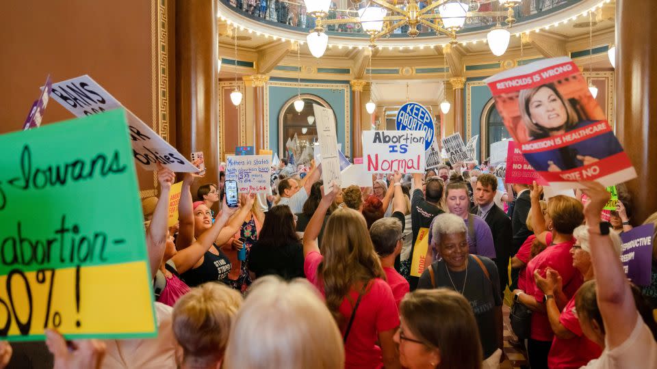 Protestors fill the Iowa State Capitol rotunda, as the Iowa Legislature convenes for special session to pass 6-week 'fetal heartbeat' abortion ban Tuesday, July 11, 2023.  - Zach Boyden-Holmes/The Des Moines Register/AP