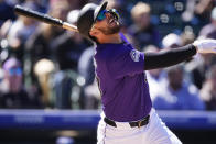 Colorado Rockies' Kris Bryant flies out against Tampa Bay Rays starting pitcher Ryan Pepiot to end the fourth inning of a baseball game Sunday, April 7, 2024, in Denver. (AP Photo/David Zalubowski)