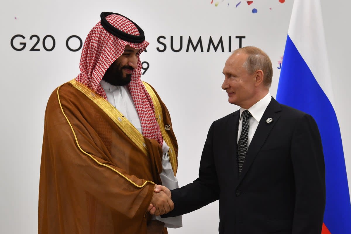 File: Russia’s president Vladimir Putin (R) shakes hands with Saudi Arabia’s Crown Prince Mohammed bin Salman during a meeting on the sidelines of the G20 Summit in Osaka, 29 June 2019 (AFP via Getty Images)