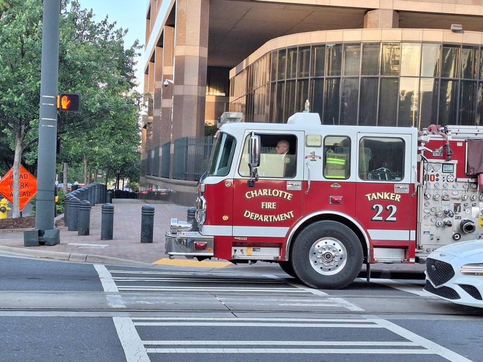 Tanker 22 leaves a parking lot across from CMPD headquarters to stage near First Baptist Church for the Officer Joshua Eyer processional.