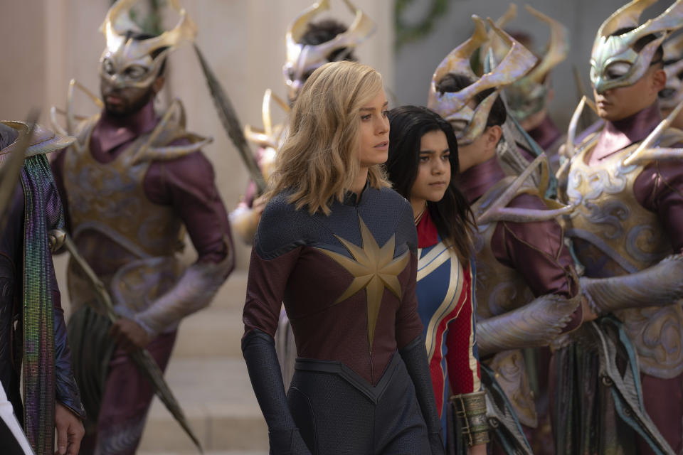 This image released by Disney shows Brie Larson, left, and Iman Vellani in a scene from "The Marvels." (Laura Radford/Disney-Marvel Studios via AP)