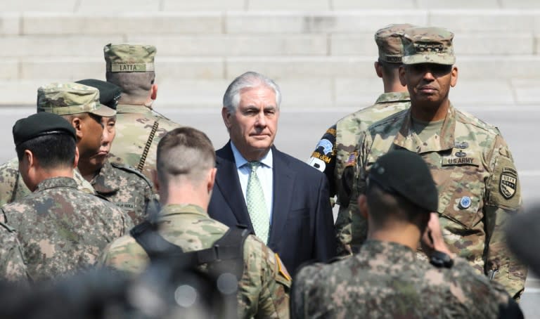 US Secretary of State Rex Tillerson (C) visits the border village of Panmunjom during a trip to the Demilitarised Zone dividing the two Koreas