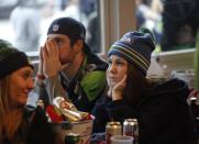 Seattle Seahawks fans watch Super Bowl XLIX at the Hawks Nest bar in Seattle, Washington.