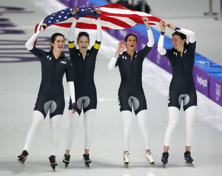 Speed Skating - Pyeongchang 2018 Winter Olympics - Women's Team Pursuit competition finals - Gangneung Oval - Gangneung, South Korea - February 21, 2018 - Carlijn Schoutens, Heather Bergsma, Brittany Bowe and Mia Manganello of the U.S. celebrate after winning a bronze medal. REUTERS/Phil Noble