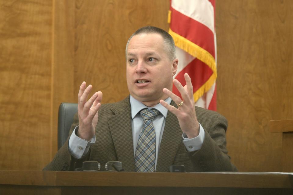 BCI investigator Eric Lehnhart testifies Tuesday morning in court during Mark Cooper's trial. Cooper is accused of causing the death of a jail inmate in 2019.