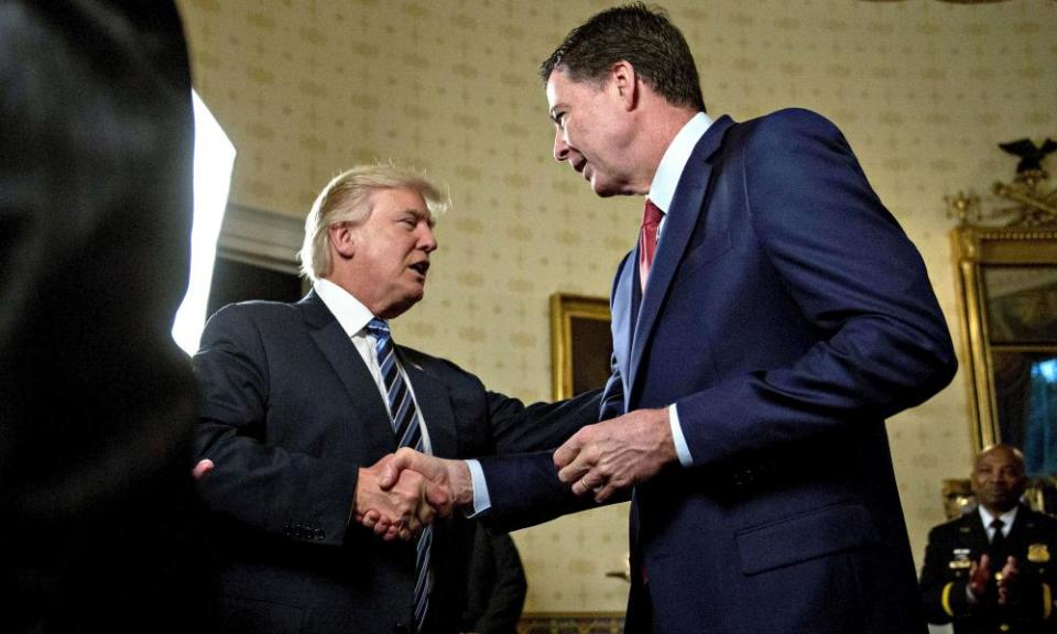 Donald Trump and James Comey at the White House on 22 Jan 2017.