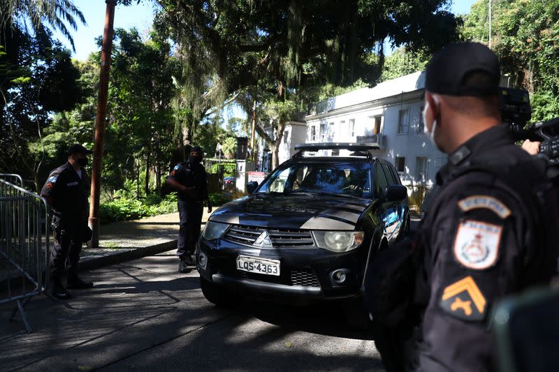 Brazilian federal police vehicle leaves Laranjeiras Palace in Rio de Janeiro