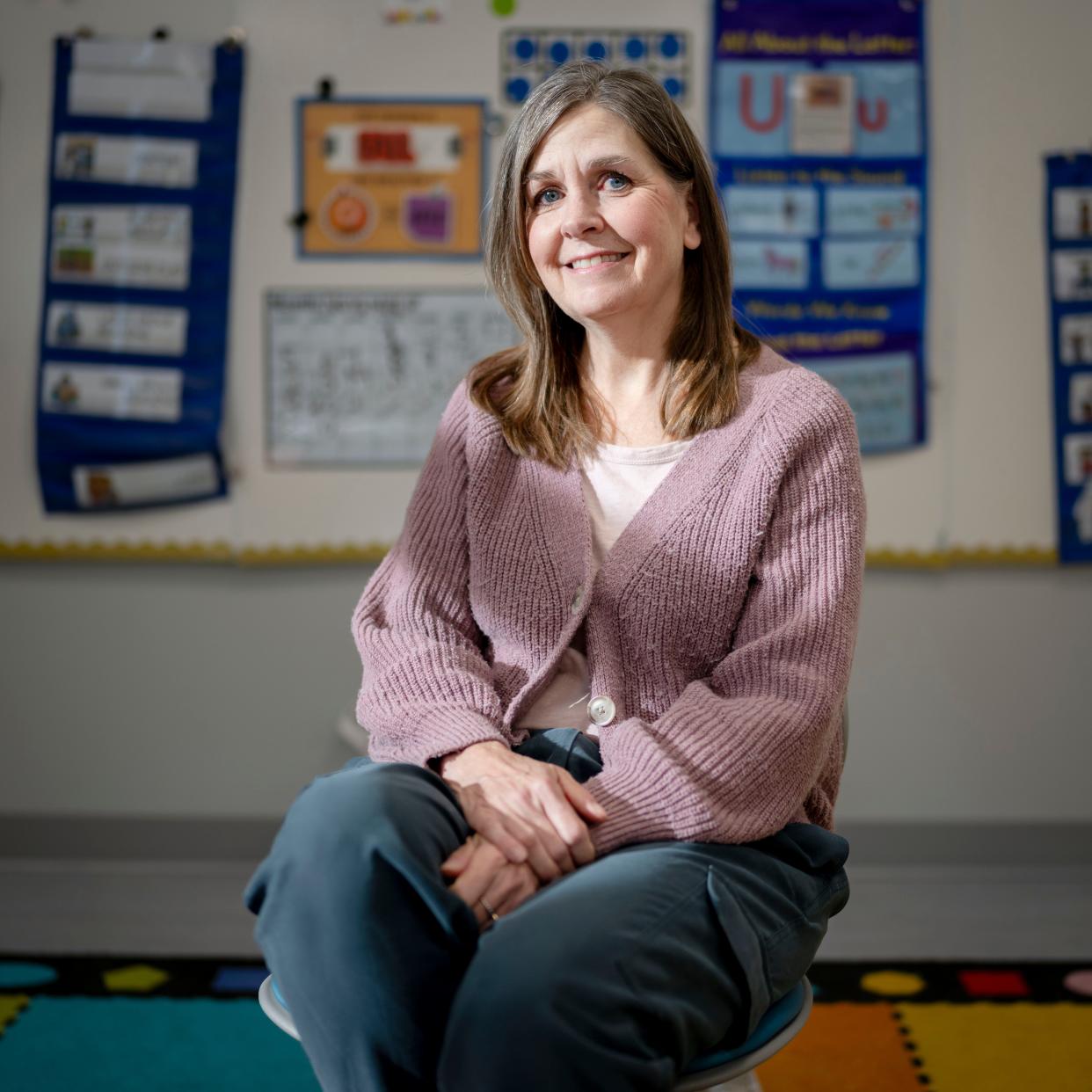 Kindergarten teacher Teresa Miller sits for a photo in her classroom at Early Elementary School in Storm Lake, Tuesday, Nov. 28, 2023.