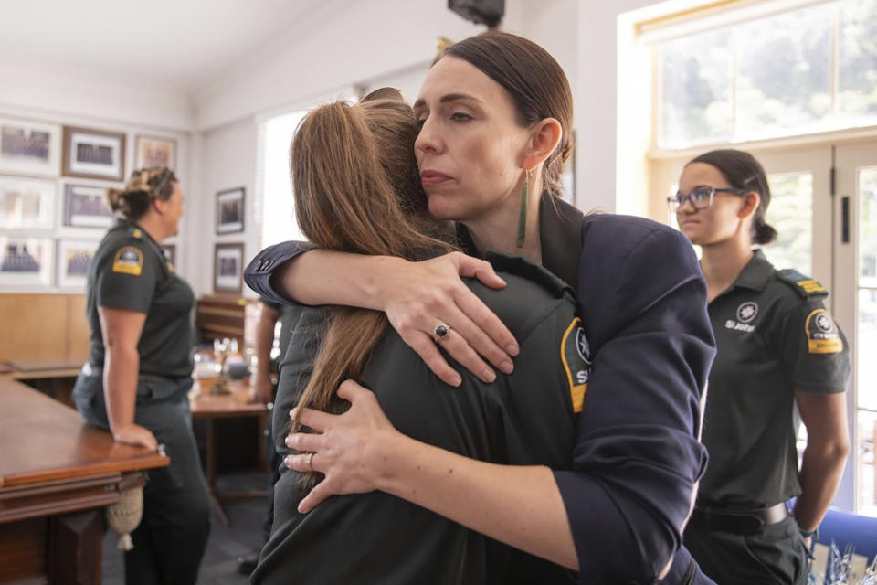 Jacinda Ardern hugs a first responder in Whakatane, New Zealand, the day after a volcanic island in New Zealand erupted on Dec. 9, 2019.  (Photo: Dom Thomas/Pool Photo via AP)