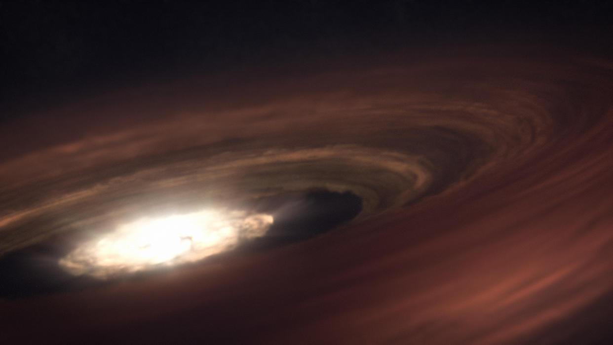  An artist's illustration of a planet-forming disk around a baby star. In the center of the disk, there's a white-yellow glow. The disk itself looks like a giant donut with rapidly swirling gas and dust. 