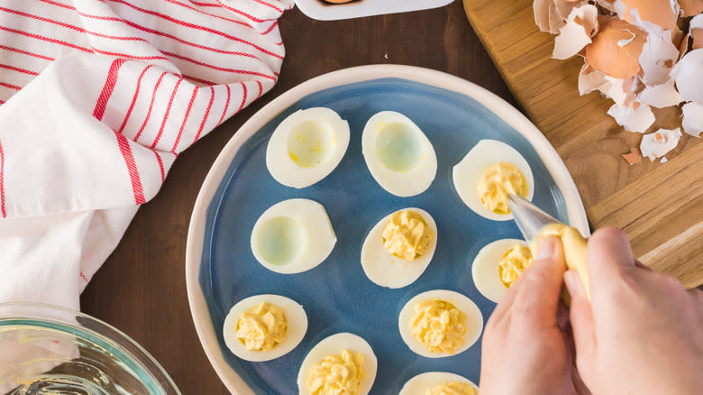 A plate with egg white halves