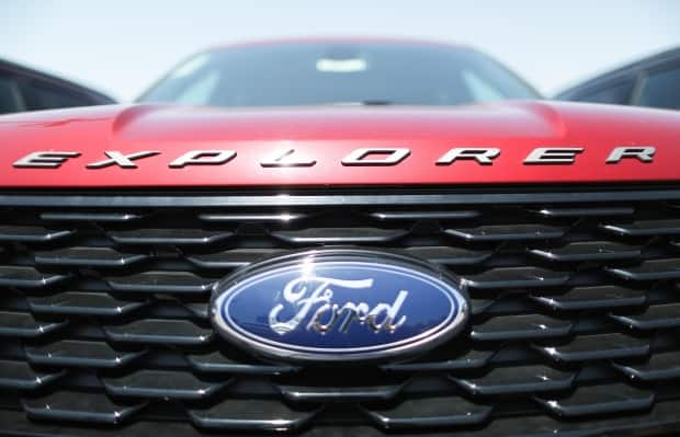 Ford Motor Co. announced Sunday that it is recalling Explorer SUV models from 2016 through 2019 over concerns that roof rail covers could detach from the vehicle. (Mario Tama/Getty Images - image credit)