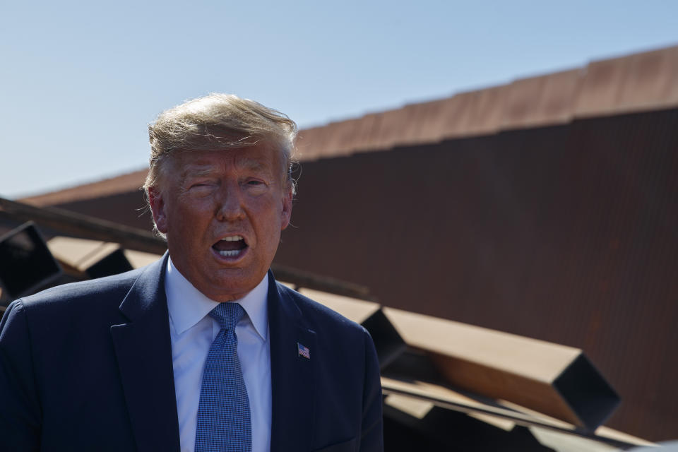 President Trump talks with reporters in Otay Mesa, Calif., on Wednesday. (Photo: Evan Vucci/AP)                                                                                                                                                                                                                                                                                                                                     