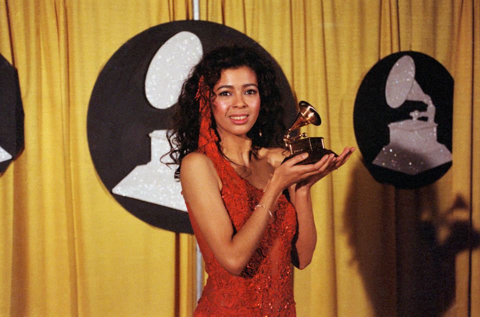 Irene Cara at the Grammy Awards wearing red dress