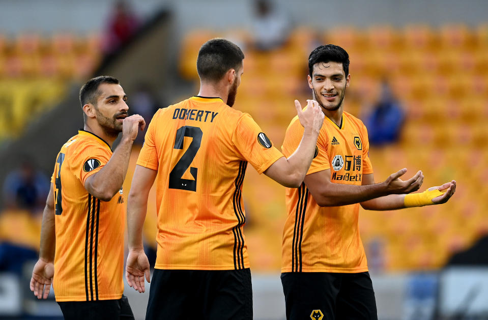 WOLVERHAMPTON, ENGLAND - AUGUST 06: Raul Jimenez of Wolves celebrates after scoring his sides first goal during the UEFA Europa League round of 16 second leg match between Wolverhampton Wanderers and Olympiacos FC at Molineux on August 06, 2020 in Wolverhampton, England. (Photo by Laurence Griffiths/Getty Images)