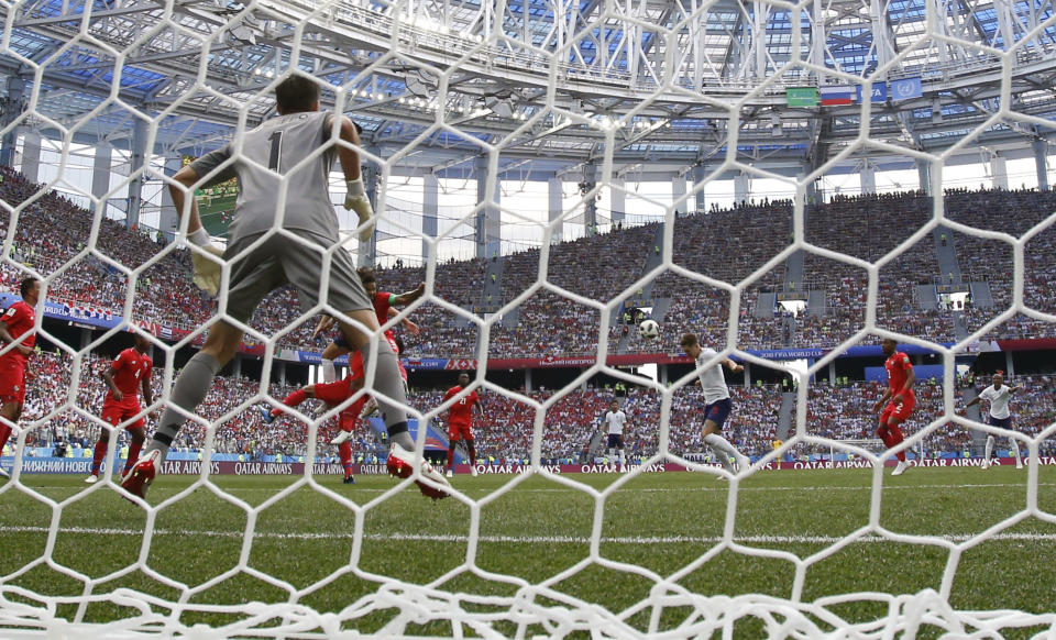 <p>England’s John Stones scores his side’s opening goal during the group G match </p>