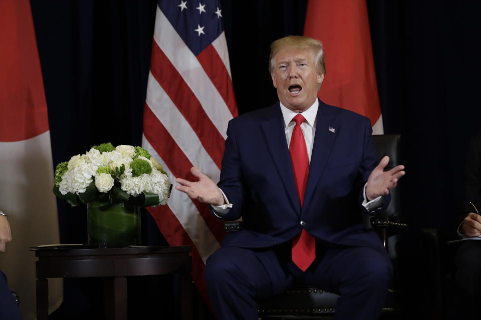 President Donald Trump talks while meeting with Japanese Prime Minister Shinzo Abe at the InterContinental Barclay New York hotel during the United Nations General Assembly, Wednesday, Sept. 25, 2019, in New York. (AP Photo/Evan Vucci)