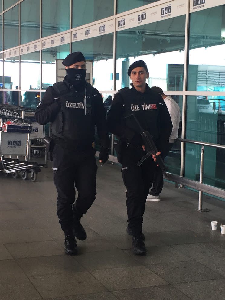 Armed guards at Atatürk Airport in Istanbul, Turkey. [Photo: Erica Rae Chong]