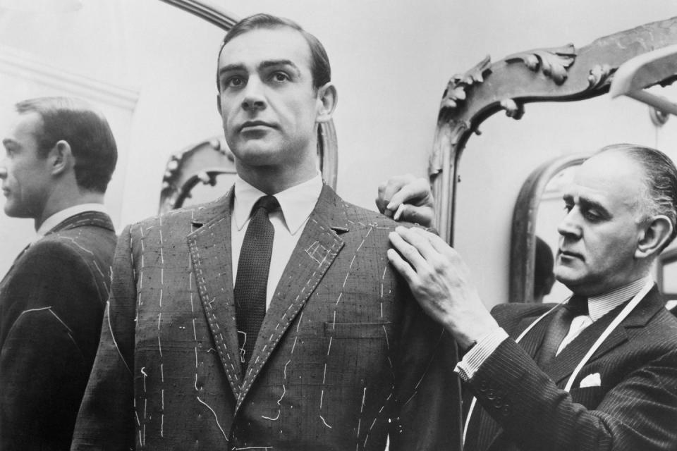 <p>Tailor Anthony Sinclair fitting Sean Connery for one of the suits he will wear in the film <em>From Russia With Love </em>in Mayfair, London.</p>