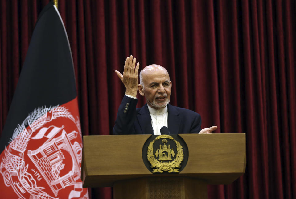 Afghan President Ashraf Ghani speaks during a news conference at the presidential palace in Kabul, Afghanistan, Sunday, March, 1, 2020. Ghani said Sunday he won't be releasing the 5,000 prisoners the Taliban say must be freed before intra-Afghan negotiations can begin. (AP Photo/Rahmat Gul)