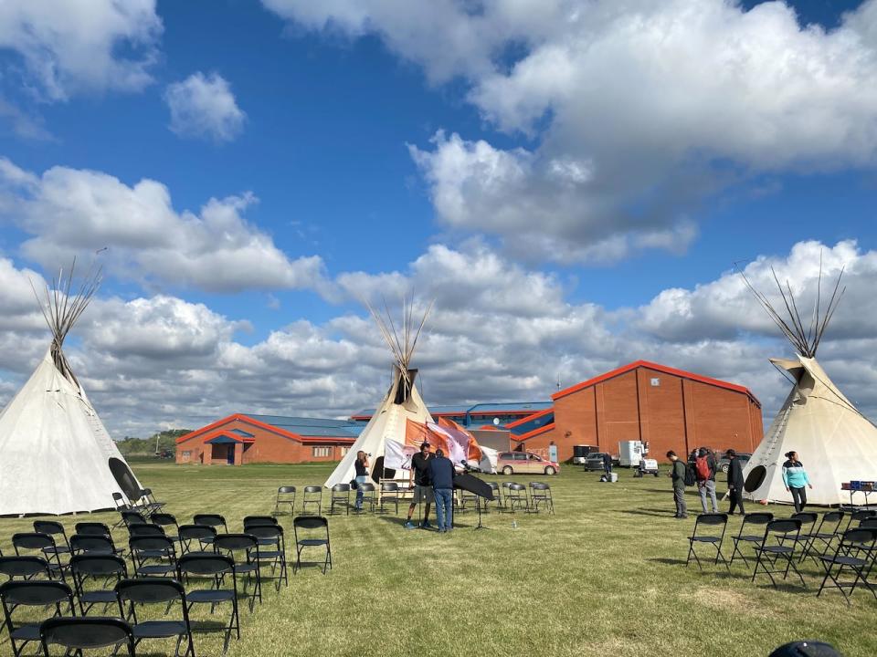 Three teepees are set up behind the James Smith Cree Nation's school on Thursday Sept. 8, 2022. They were put up following the stabbing attack for people to have a ceremony, find healing and honour those that lost their lives.