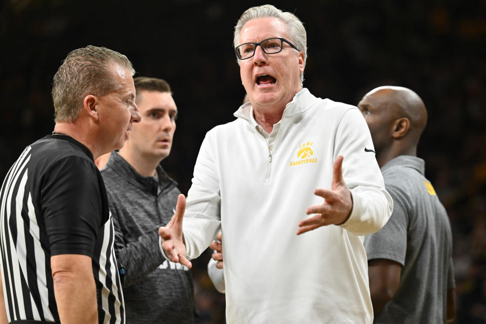 Dec 11, 2022; Iowa City, Iowa, USA; Iowa Hawkeyes head coach Fran McCaffery reacts with an official during the first half against the Wisconsin Badgers at Carver-Hawkeye Arena. Mandatory Credit: Jeffrey Becker-USA TODAY Sports