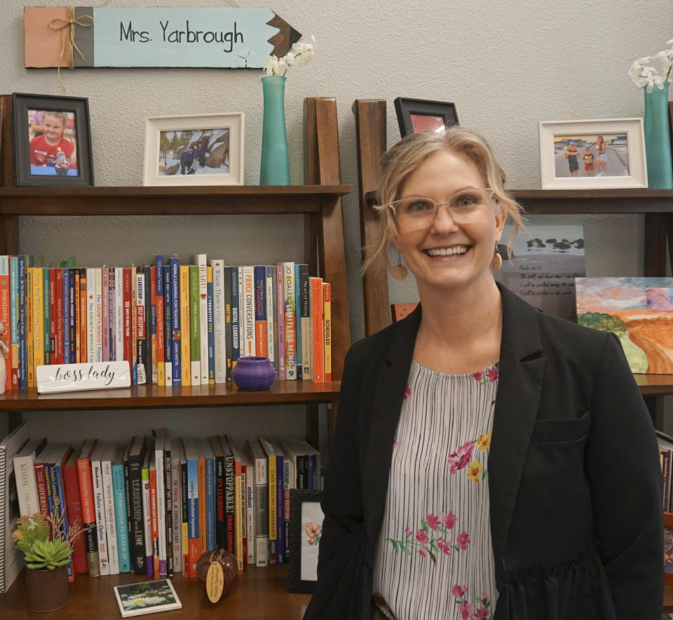 Heather Yarbrough, the principal at Endeavor Elementary, poses for a photo on Feb. 29, 2024, in Nampa, Idaho. Yarbrough started an onsite daycare at the school to help retain teachers. (Carly Flandro/Idaho Education News via AP)