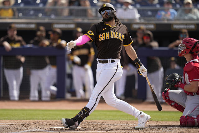 Arizona Diamondbacks' Corbin Carroll follows through with his swing during  the first inning of a spring training baseball game against the Los Angeles  Dodgers Thursday, March 2, 2023, in Phoenix. (AP Photo/Ross