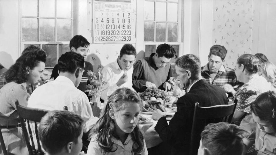 Families Eating Thanksgiving Dinner