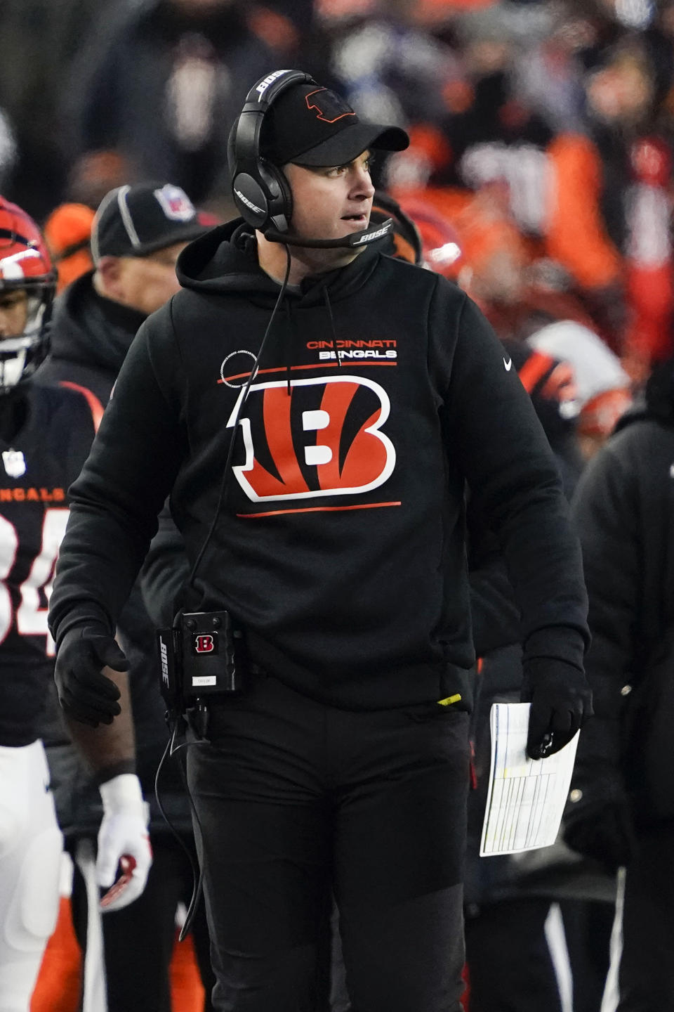 Cincinnati Bengals head coach Zac Taylor watches during the first half of an NFL wild-card playoff football game against the Las Vegas Raiders, Saturday, Jan. 15, 2022, in Cincinnati. (AP Photo/Jeff Dean)