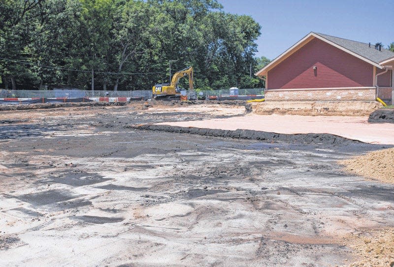 Soil contaminated with coal ash is being removed from a half-acre park at the Town of Pines Town Hall, off Delaware Street and U.S. 12.Tribune Photo/ROBERT FRANKLIN